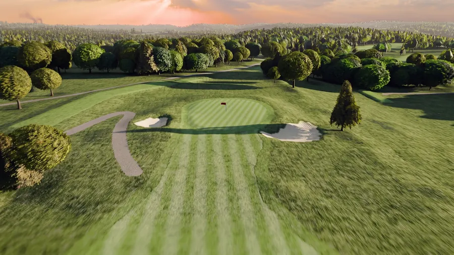 The first hole at River Ridge in golden light, from the air.