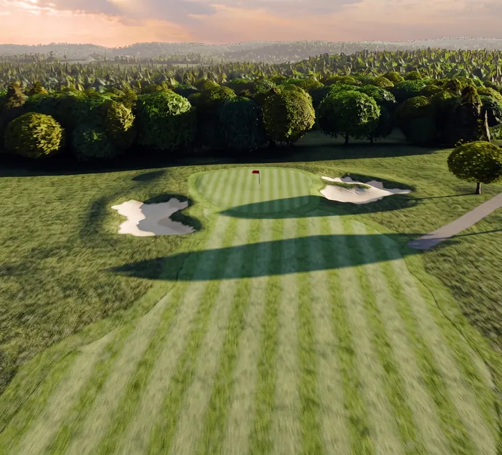 The third green at River Ridge, bunker and flag in golden light.