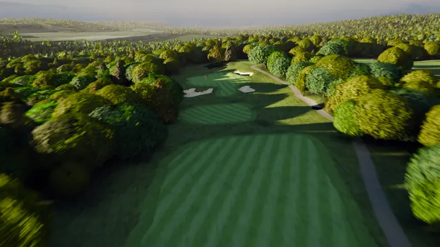 The fifteenth green and its sand at dusk.